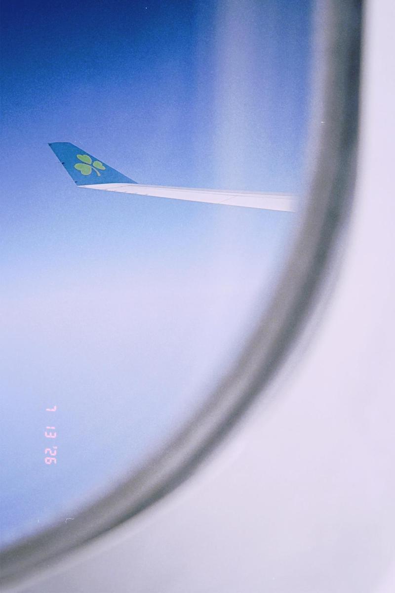 Plane wing out view of a plane window
